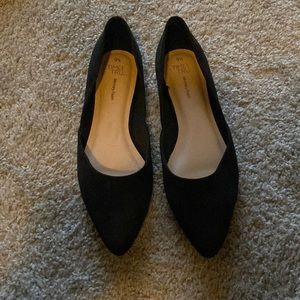 Pointed toe black suede flats